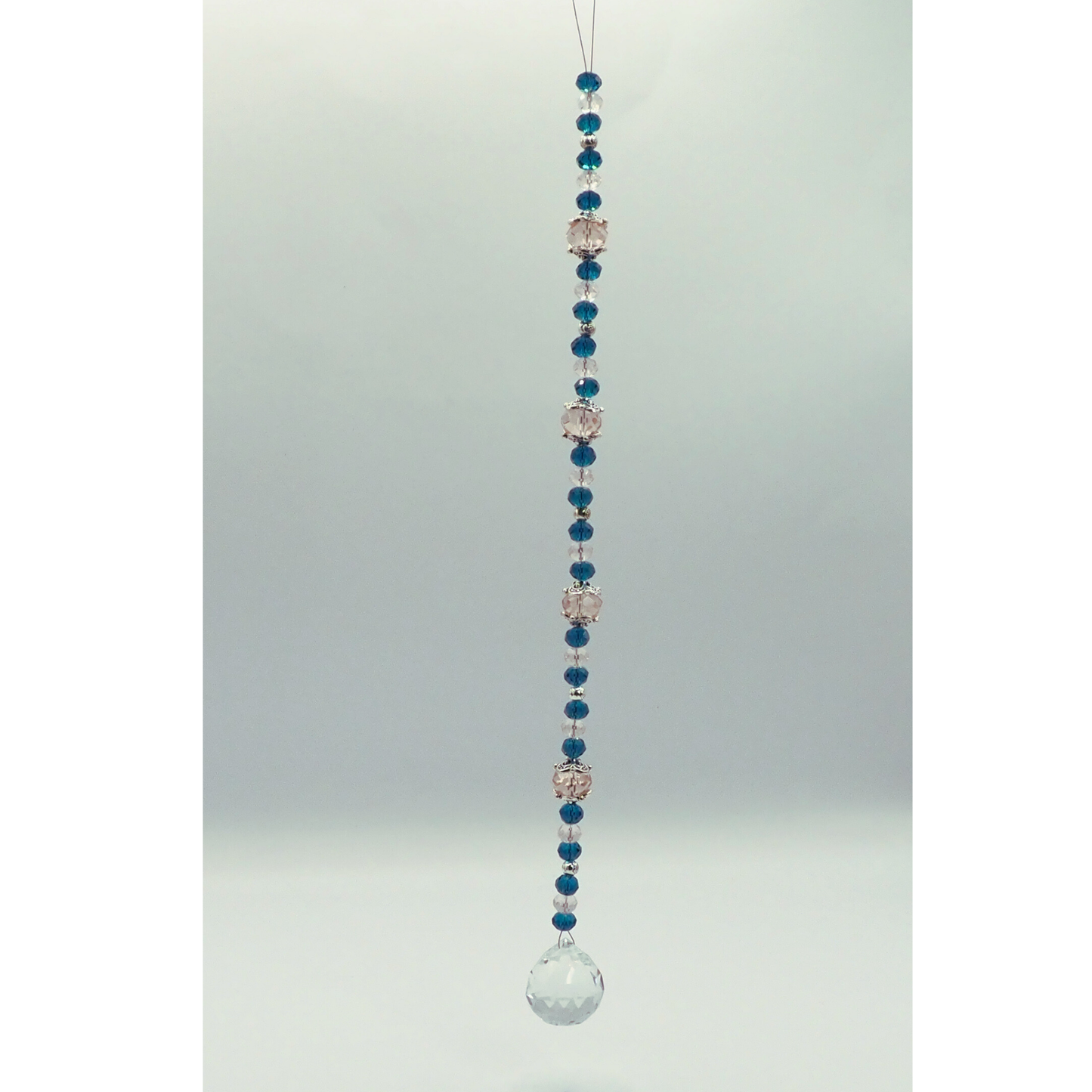 Playful Turquoise Suncatcher